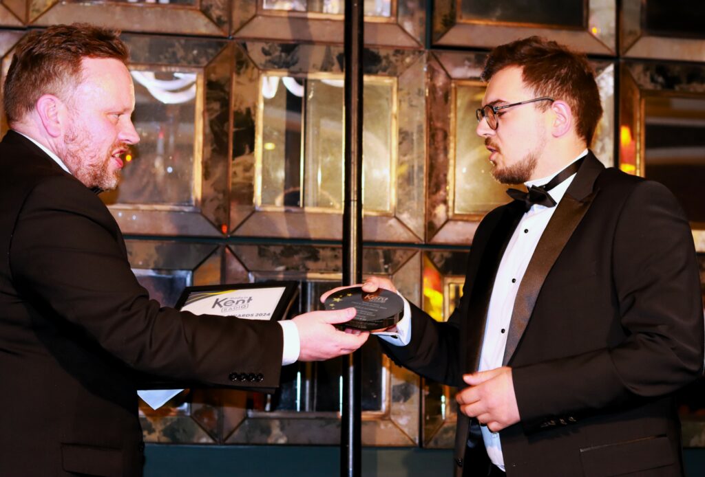 Man receiving award.